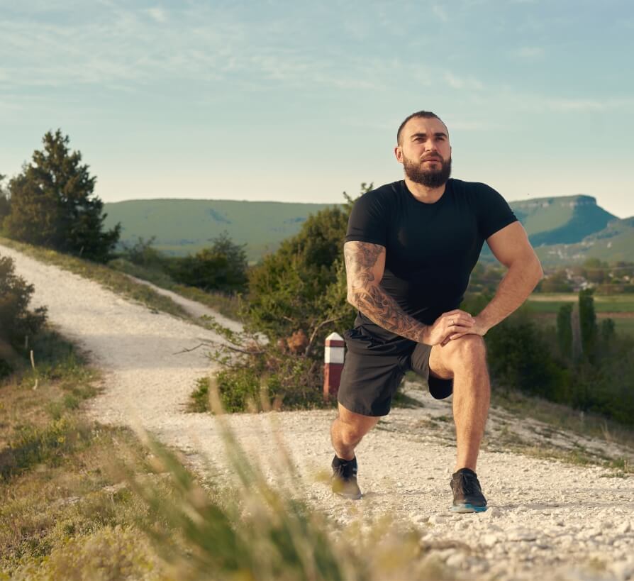 male-athlete-warming-up-before-start-running-in-mo-2023-11-27-05-32-27-utc-1